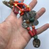 bijoux marocaine,Ornement de natte en corail ,Oulad Yahya, Vallée du Draa corail et ancienne monnaie